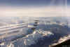 Eine saubere Viererformation mit Kondensstreifen in 25000 ft (ca.8500 m) Hhe kreuzt bei Innsbruck die sterreichischen Alpen.