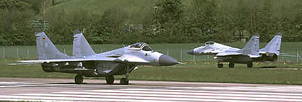 A MiG on the runway and one on the taxi-track