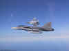 The MiG breaks away.