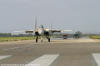 Getting ready for the fight - MiGs behind F-15.